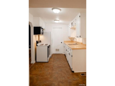 What an amazing opportunity to own an affordable home in on Edgewood Country Club in Michigan - for sale on GolfHomes.com, golf home, golf lot