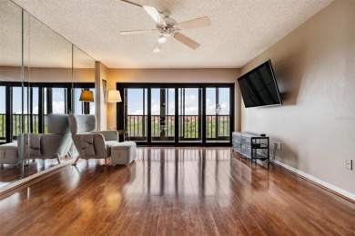 The view truly takes the cake in this stunning top-floor condo on Cove Cay Country Club in Florida - for sale on GolfHomes.com, golf home, golf lot