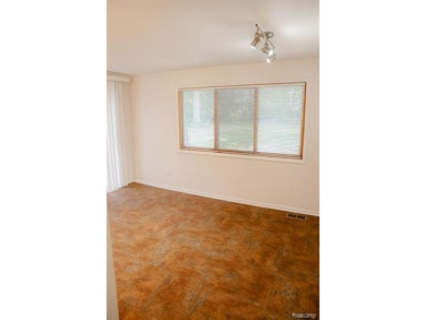 What an amazing opportunity to own an affordable home in on Edgewood Country Club in Michigan - for sale on GolfHomes.com, golf home, golf lot