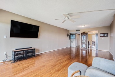 The view truly takes the cake in this stunning top-floor condo on Cove Cay Country Club in Florida - for sale on GolfHomes.com, golf home, golf lot
