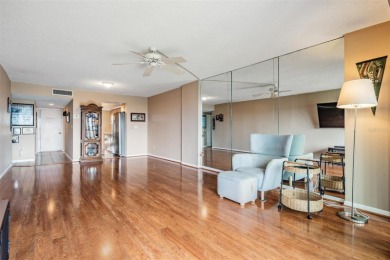 The view truly takes the cake in this stunning top-floor condo on Cove Cay Country Club in Florida - for sale on GolfHomes.com, golf home, golf lot