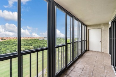 The view truly takes the cake in this stunning top-floor condo on Cove Cay Country Club in Florida - for sale on GolfHomes.com, golf home, golf lot
