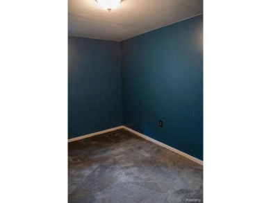 What an amazing opportunity to own an affordable home in on Edgewood Country Club in Michigan - for sale on GolfHomes.com, golf home, golf lot