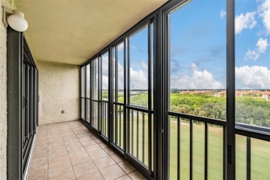 The view truly takes the cake in this stunning top-floor condo on Cove Cay Country Club in Florida - for sale on GolfHomes.com, golf home, golf lot