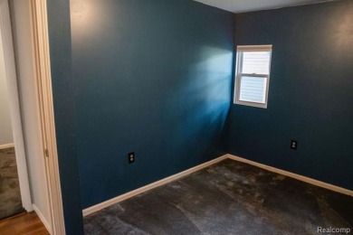 What an amazing opportunity to own an affordable home in on Edgewood Country Club in Michigan - for sale on GolfHomes.com, golf home, golf lot