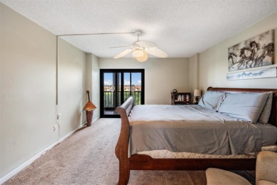 The view truly takes the cake in this stunning top-floor condo on Cove Cay Country Club in Florida - for sale on GolfHomes.com, golf home, golf lot