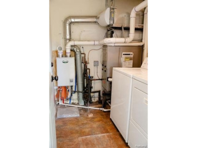 What an amazing opportunity to own an affordable home in on Edgewood Country Club in Michigan - for sale on GolfHomes.com, golf home, golf lot
