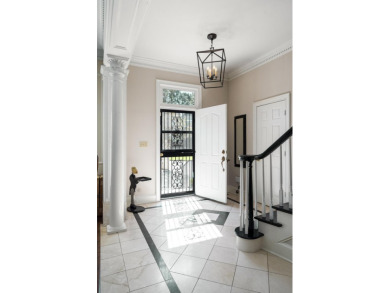 Nestled privately on coveted Charles Towne Place - a quiet on Woodside Plantation Country Club in South Carolina - for sale on GolfHomes.com, golf home, golf lot