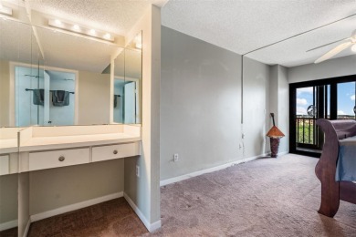 The view truly takes the cake in this stunning top-floor condo on Cove Cay Country Club in Florida - for sale on GolfHomes.com, golf home, golf lot