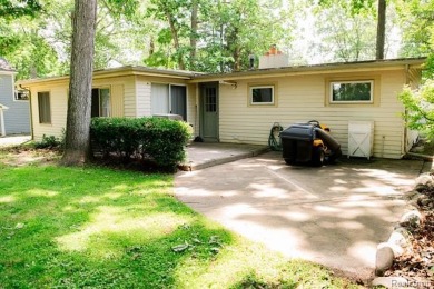 What an amazing opportunity to own an affordable home in on Edgewood Country Club in Michigan - for sale on GolfHomes.com, golf home, golf lot