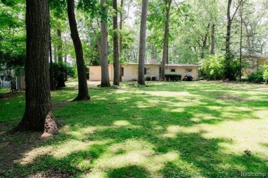 What an amazing opportunity to own an affordable home in on Edgewood Country Club in Michigan - for sale on GolfHomes.com, golf home, golf lot