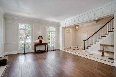 Nestled privately on coveted Charles Towne Place - a quiet on Woodside Plantation Country Club in South Carolina - for sale on GolfHomes.com, golf home, golf lot