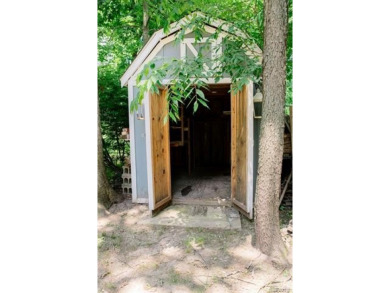 What an amazing opportunity to own an affordable home in on Edgewood Country Club in Michigan - for sale on GolfHomes.com, golf home, golf lot