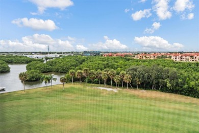 The view truly takes the cake in this stunning top-floor condo on Cove Cay Country Club in Florida - for sale on GolfHomes.com, golf home, golf lot