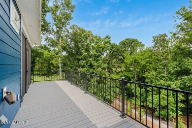 BEAUTIFUL, modern home with craftsman details.  This stunning on Tanasi Golf Course in Tennessee - for sale on GolfHomes.com, golf home, golf lot