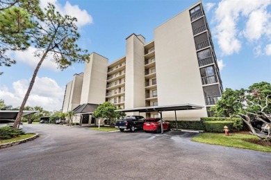 The view truly takes the cake in this stunning top-floor condo on Cove Cay Country Club in Florida - for sale on GolfHomes.com, golf home, golf lot