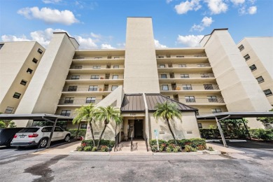 The view truly takes the cake in this stunning top-floor condo on Cove Cay Country Club in Florida - for sale on GolfHomes.com, golf home, golf lot
