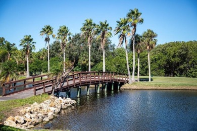 The view truly takes the cake in this stunning top-floor condo on Cove Cay Country Club in Florida - for sale on GolfHomes.com, golf home, golf lot