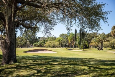 The view truly takes the cake in this stunning top-floor condo on Cove Cay Country Club in Florida - for sale on GolfHomes.com, golf home, golf lot