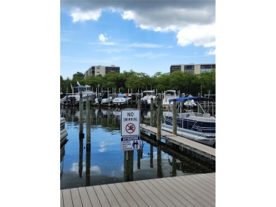 Under contract-accepting backup offers. The view truly takes the on Cove Cay Country Club in Florida - for sale on GolfHomes.com, golf home, golf lot