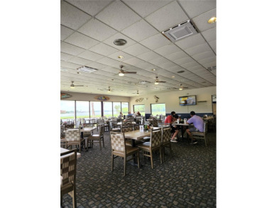 Under contract-accepting backup offers. The view truly takes the on Cove Cay Country Club in Florida - for sale on GolfHomes.com, golf home, golf lot