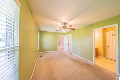 This welcoming 3-bedroom, 2-bath home sits on just over an acre on Paxton Park Golf Course in Kentucky - for sale on GolfHomes.com, golf home, golf lot