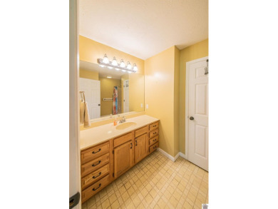 This welcoming 3-bedroom, 2-bath home sits on just over an acre on Paxton Park Golf Course in Kentucky - for sale on GolfHomes.com, golf home, golf lot