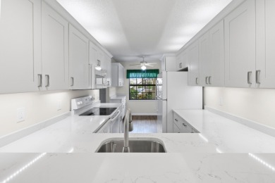 Beautiful and spacious first-floor 2 bedroom, 2 bath condo on The Golf Club of Jupiter in Florida - for sale on GolfHomes.com, golf home, golf lot