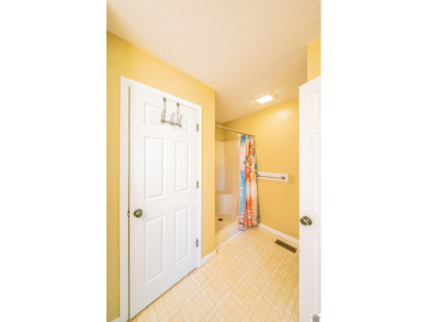 This welcoming 3-bedroom, 2-bath home sits on just over an acre on Paxton Park Golf Course in Kentucky - for sale on GolfHomes.com, golf home, golf lot