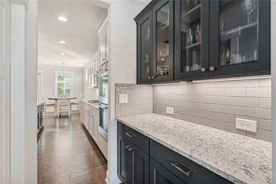 Live Your Best Life! INCREDIBLE 2-Story Home with Primary Suite on Traditions of Braselton Golf Club in Georgia - for sale on GolfHomes.com, golf home, golf lot