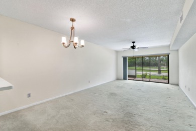 Beautiful and spacious first-floor 2 bedroom, 2 bath condo on The Golf Club of Jupiter in Florida - for sale on GolfHomes.com, golf home, golf lot
