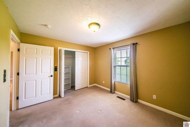 This welcoming 3-bedroom, 2-bath home sits on just over an acre on Paxton Park Golf Course in Kentucky - for sale on GolfHomes.com, golf home, golf lot