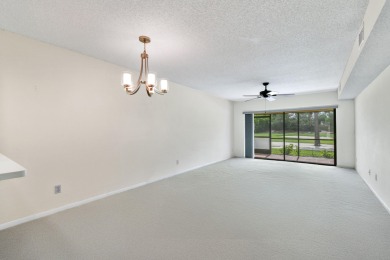 Beautiful and spacious first-floor 2 bedroom, 2 bath condo on The Golf Club of Jupiter in Florida - for sale on GolfHomes.com, golf home, golf lot