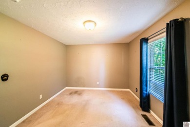 This welcoming 3-bedroom, 2-bath home sits on just over an acre on Paxton Park Golf Course in Kentucky - for sale on GolfHomes.com, golf home, golf lot