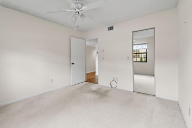 Beautiful and spacious first-floor 2 bedroom, 2 bath condo on The Golf Club of Jupiter in Florida - for sale on GolfHomes.com, golf home, golf lot