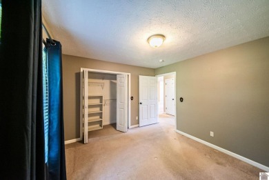 This welcoming 3-bedroom, 2-bath home sits on just over an acre on Paxton Park Golf Course in Kentucky - for sale on GolfHomes.com, golf home, golf lot