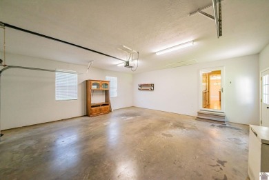This welcoming 3-bedroom, 2-bath home sits on just over an acre on Paxton Park Golf Course in Kentucky - for sale on GolfHomes.com, golf home, golf lot