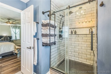 Beautiful updated home in Gates Four. Located in the best school on Gates Four Golf and Country Club in North Carolina - for sale on GolfHomes.com, golf home, golf lot