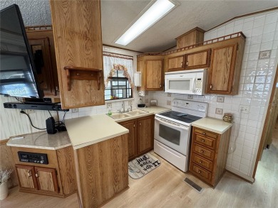Motivated Seller!!! Charming 2-Bedroom Home in a Beautiful 55+ on Deer Creek RV Golf Resort in Florida - for sale on GolfHomes.com, golf home, golf lot