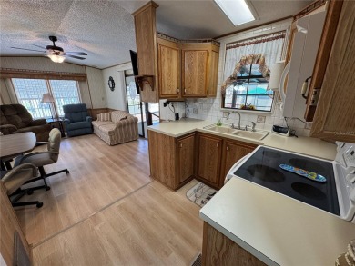Motivated Seller!!! Charming 2-Bedroom Home in a Beautiful 55+ on Deer Creek RV Golf Resort in Florida - for sale on GolfHomes.com, golf home, golf lot