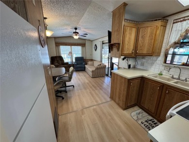 Motivated Seller!!! Charming 2-Bedroom Home in a Beautiful 55+ on Deer Creek RV Golf Resort in Florida - for sale on GolfHomes.com, golf home, golf lot