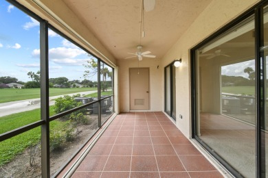 Beautiful and spacious first-floor 2 bedroom, 2 bath condo on The Golf Club of Jupiter in Florida - for sale on GolfHomes.com, golf home, golf lot
