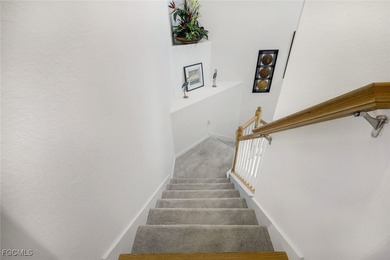 Beautiful Lakefront Coach Home with Golf Course Views! With over on Heritage Landing Golf  in Florida - for sale on GolfHomes.com, golf home, golf lot