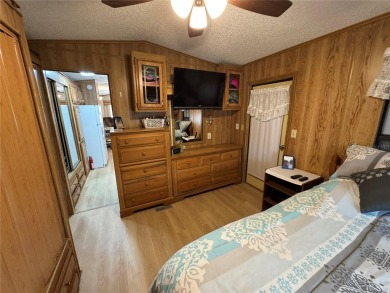 Motivated Seller!!! Charming 2-Bedroom Home in a Beautiful 55+ on Deer Creek RV Golf Resort in Florida - for sale on GolfHomes.com, golf home, golf lot
