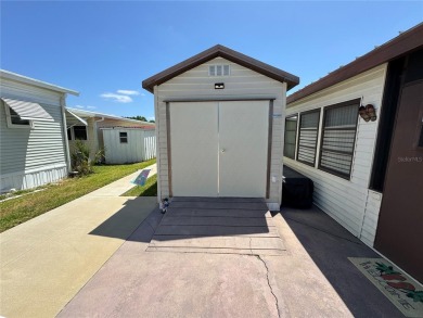 Motivated Seller!!! Charming 2-Bedroom Home in a Beautiful 55+ on Deer Creek RV Golf Resort in Florida - for sale on GolfHomes.com, golf home, golf lot