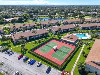 Beautiful and spacious first-floor 2 bedroom, 2 bath condo on The Golf Club of Jupiter in Florida - for sale on GolfHomes.com, golf home, golf lot