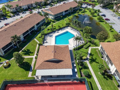 Beautiful and spacious first-floor 2 bedroom, 2 bath condo on The Golf Club of Jupiter in Florida - for sale on GolfHomes.com, golf home, golf lot