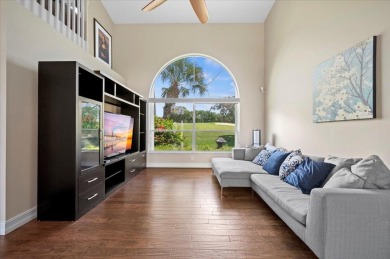 Charming 3-bedroom, 2.5-bath home at 9226 SE Wild Pine Pl on Riverbend Golf Club in Florida - for sale on GolfHomes.com, golf home, golf lot