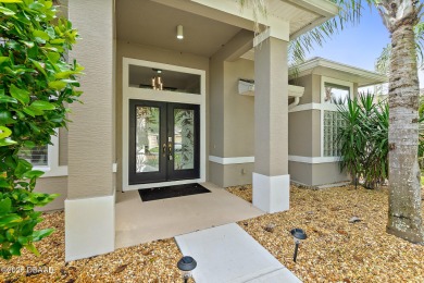 Nestled within Plantation Bay, one of Central Florida's most on Plantation Bay Golf and Country Club in Florida - for sale on GolfHomes.com, golf home, golf lot