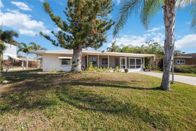 Discover coastal living in this classic 2-bedroom, 2-bath on Jacaranda West Country Club in Florida - for sale on GolfHomes.com, golf home, golf lot